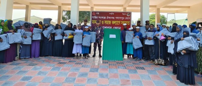 মাটিরাঙ্গা পলাশপুর জোন ৪০বিজিবি,র উদ্যােগে মানবিক সহায়তা ও শীতবস্ত্র বিতরন