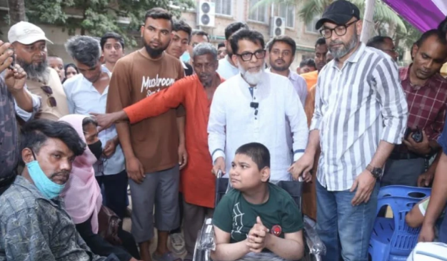 মাদারটেকে হুইলচেয়ার বিতরণ: ‘অপপ্রচারে দুর্বল হবে না বিএনপি’; হাবিবুর রশিদ