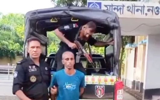 নওগাঁর মান্দায় দুইশ কেজি গাঁজা ও চারটি দেশীয় অস্ত্রসহ মাদক কারবারি গ্রেপ্তার
