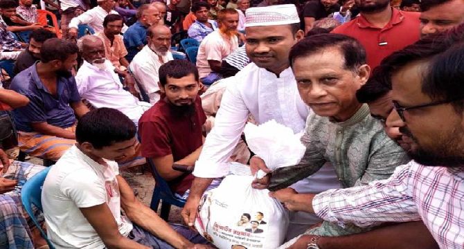 রূপগঞ্জে জিয়াউর রহমানের ৪৪তম শাহাদাৎ বার্ষিকী উপলক্ষে  প্রতিবন্ধীদের মাঝে খাদ্য সামগ্রী বিতরণ